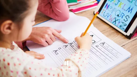 close-up of student getting assistance with homework