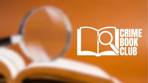 Magnifying glass on book